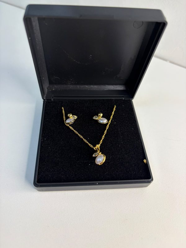 conjunto brincos e colar oval